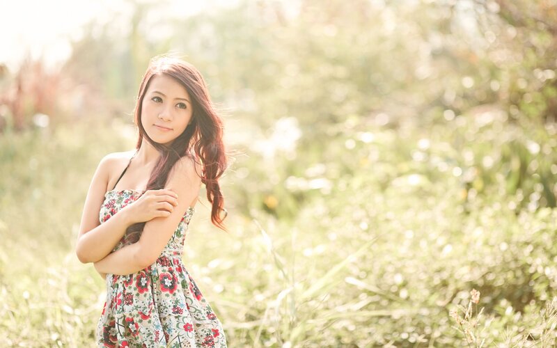woman in floral dress outdoors