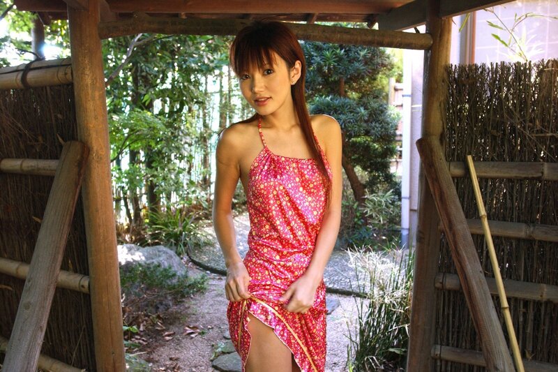 Woman in floral dress outdoors