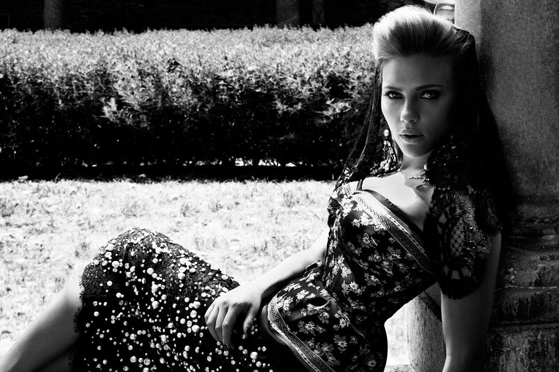 woman in floral dress sitting