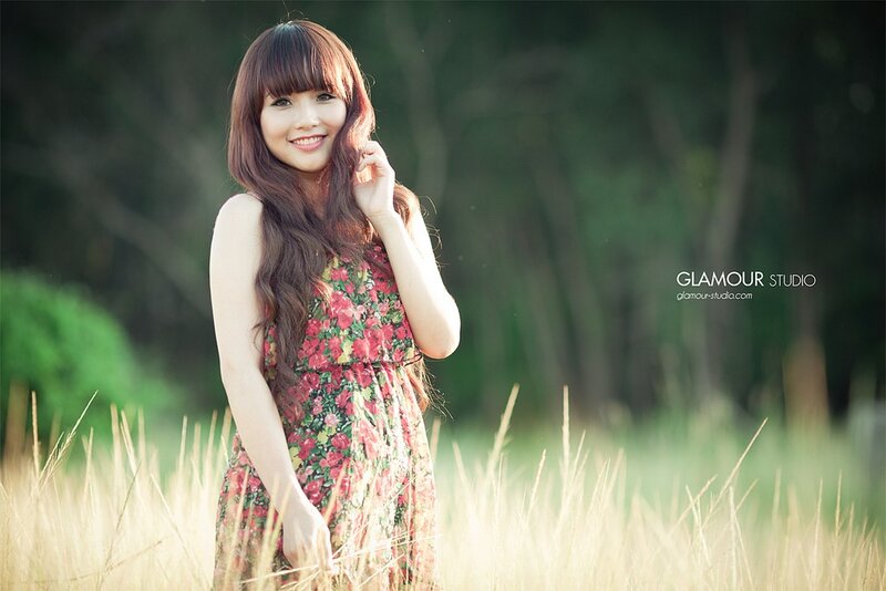 Woman in floral dress smiling