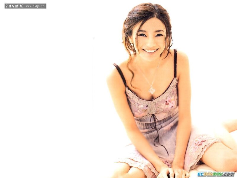woman in floral dress smiling