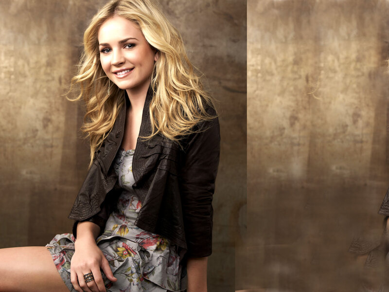 woman in floral dress smiling