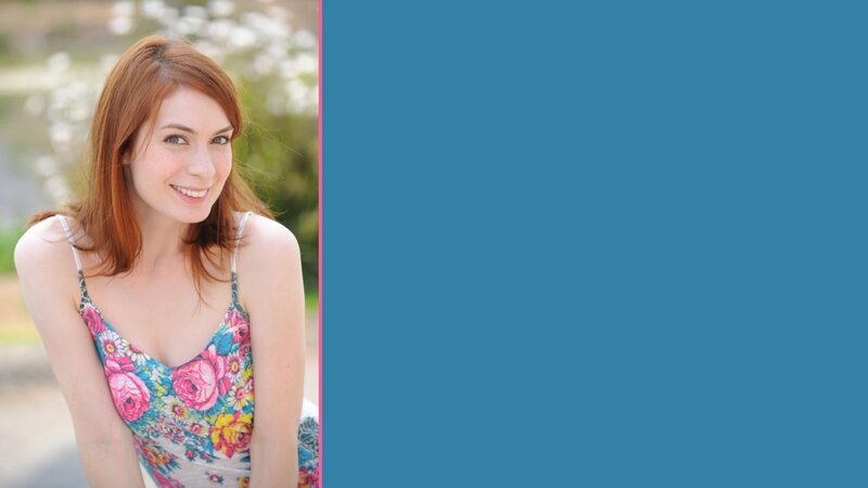 woman in floral dress smiling