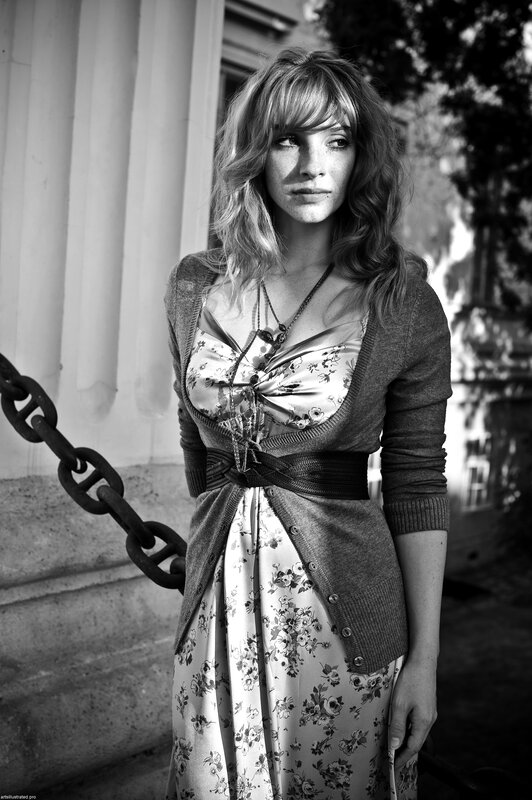 woman in floral dress standing outside