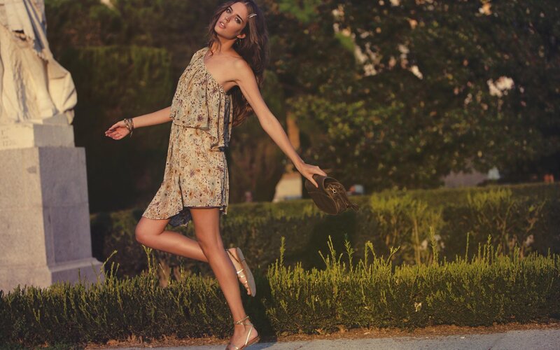 Woman in floral dress walking