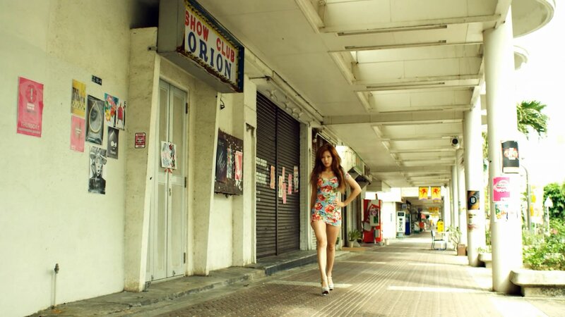 Woman in floral dress walking
