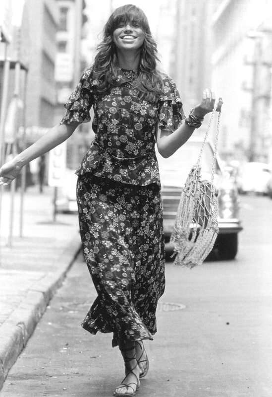 Woman in floral dress walking