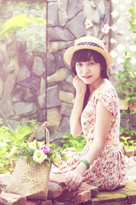 woman in floral dress with basket