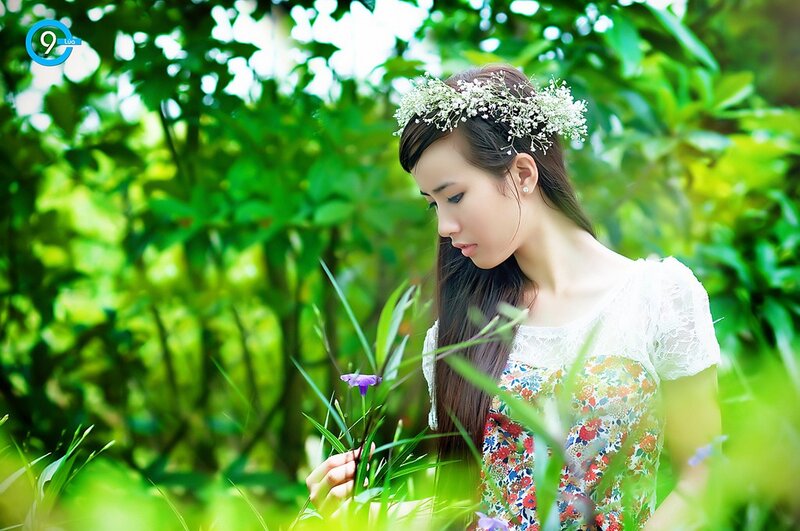 woman in floral dress with crown