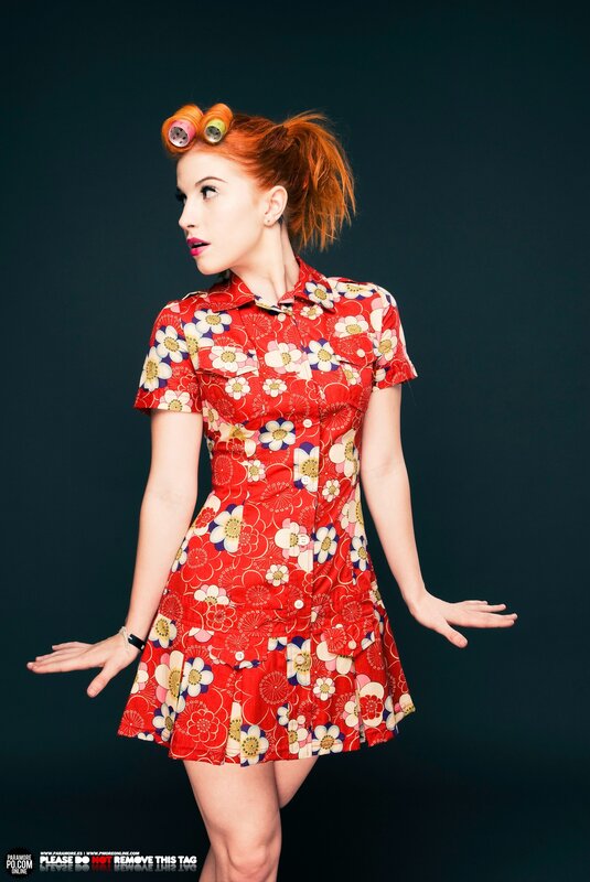 woman in floral dress with rollers