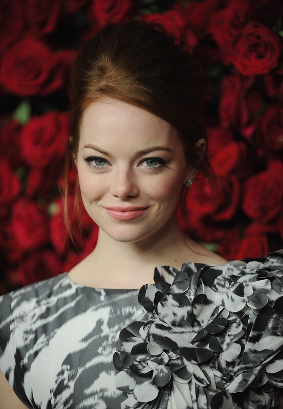 woman in floral dress with roses