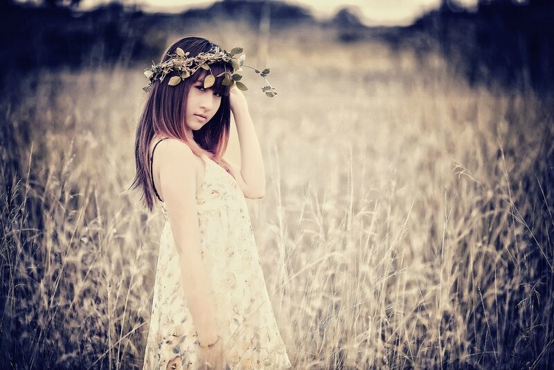 woman in floral dress with wreath