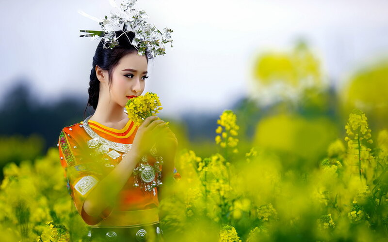 Woman in Floral Field — Yellow