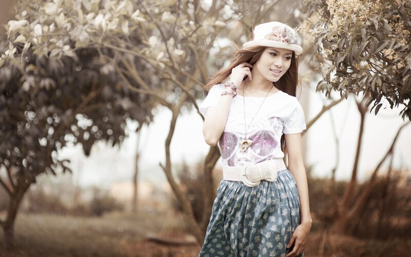 Woman in Floral Hat — White