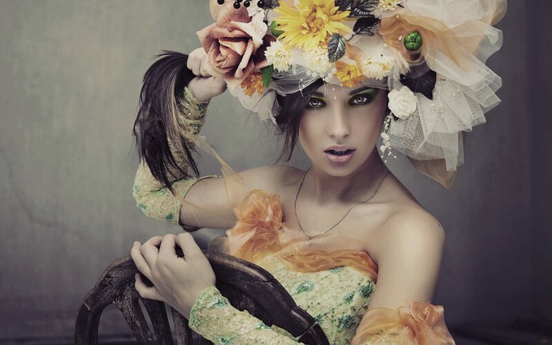 woman in floral headpiece