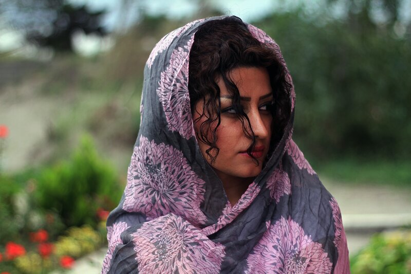 woman in floral headscarf