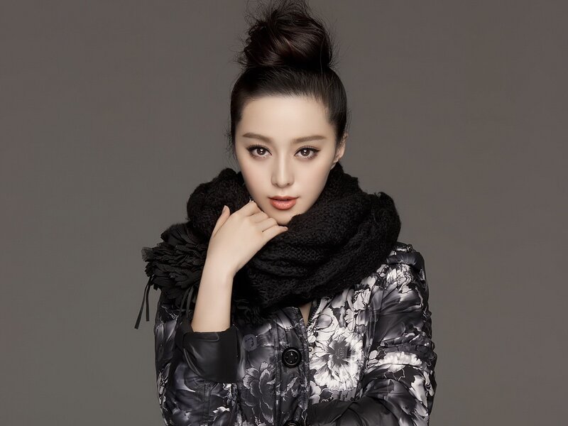 woman in floral jacket and scarf