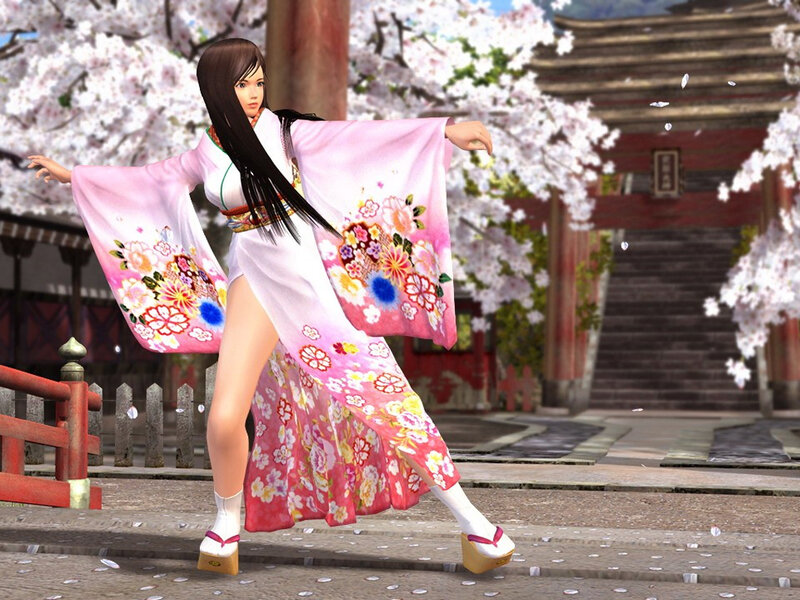 Woman in floral kimono dancing