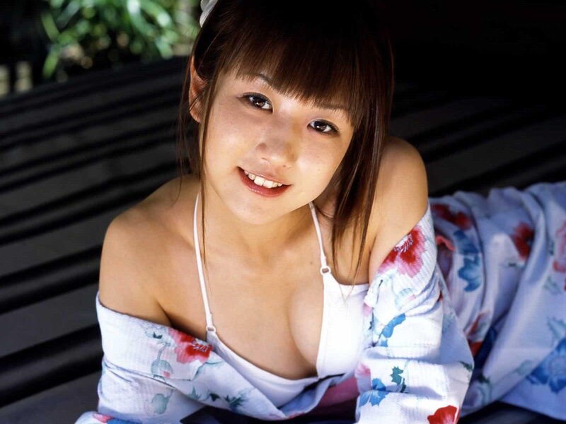 woman in floral robe smiling