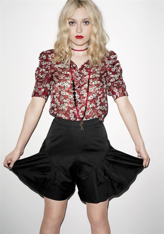 woman in floral shirt and black shorts
