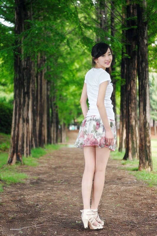 Woman in Floral Skirt — Green, Serene