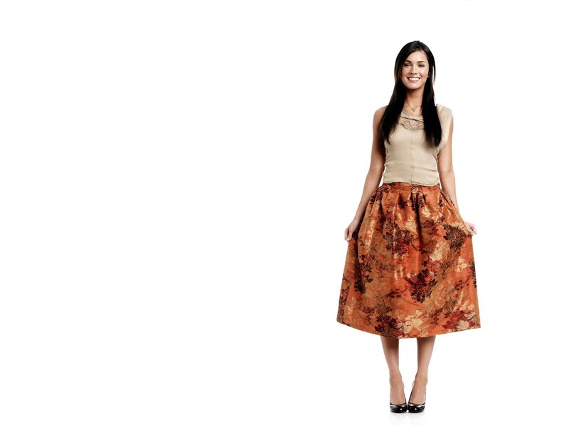 woman in floral skirt