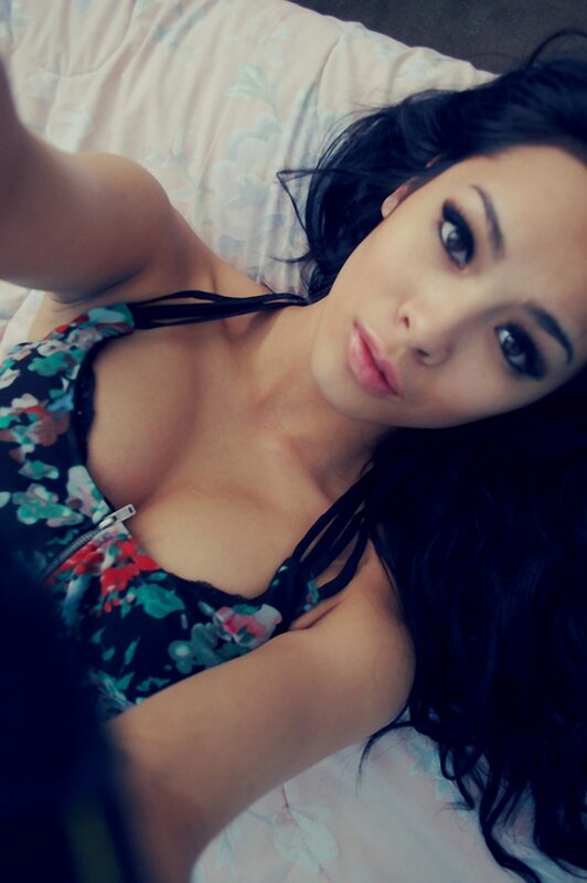 woman in floral top lying down