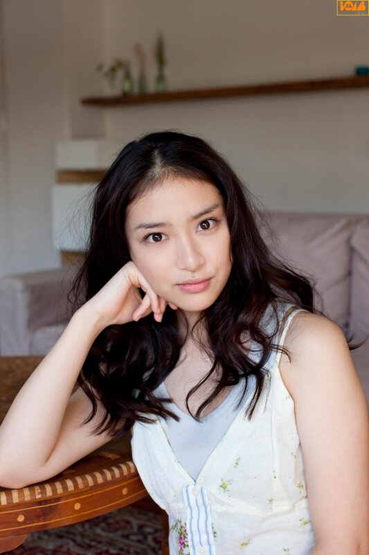 woman in floral top resting