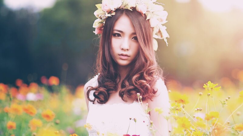 woman in flower crown field