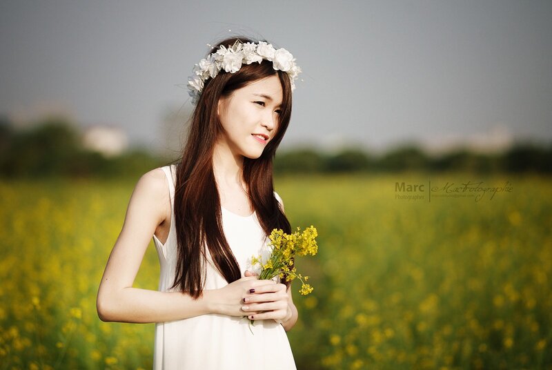woman in flower crown field