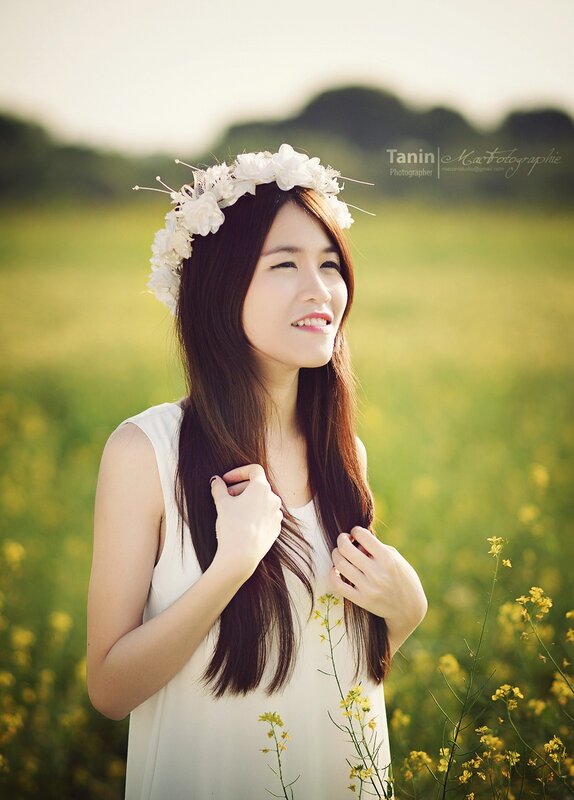 woman in flower crown field