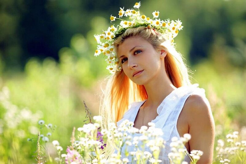 Woman in flower crown field