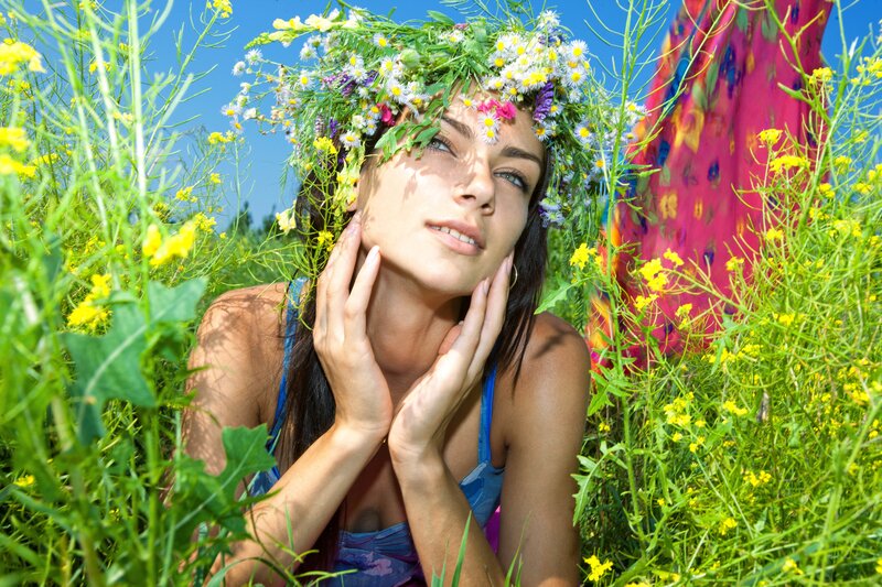 Woman in flower crown field