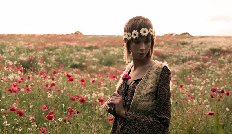 Woman in Flower Field — Red