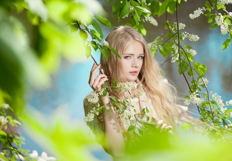 Woman in Flowering Bush