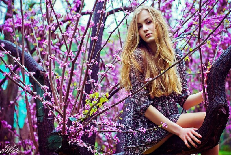 Woman in Flowering Tree