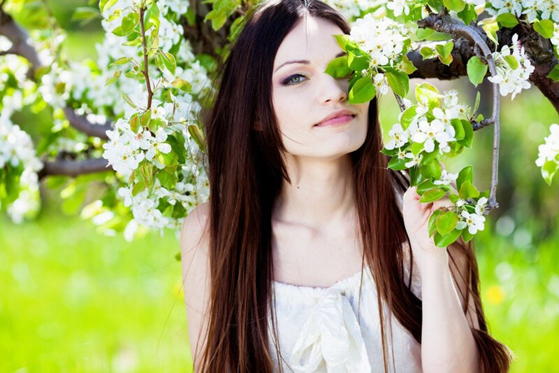 Woman in Flowering Tree — White