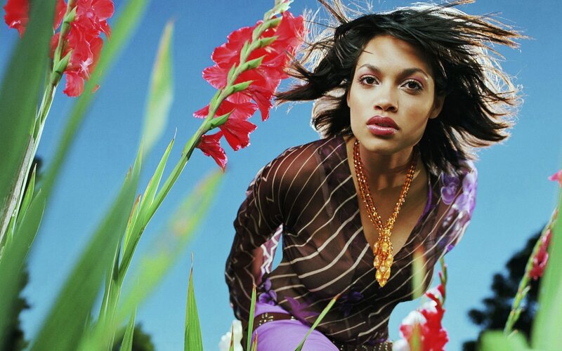 woman in flowers with blue sky