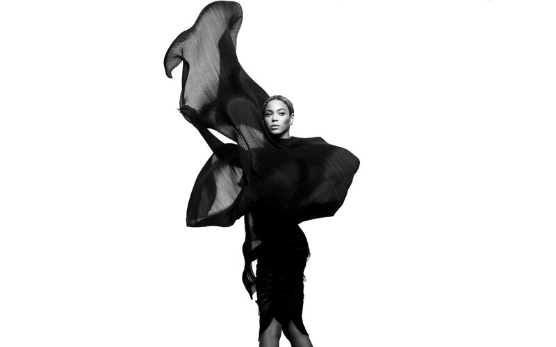 Woman in Flowing Black Dress — Dramatic
