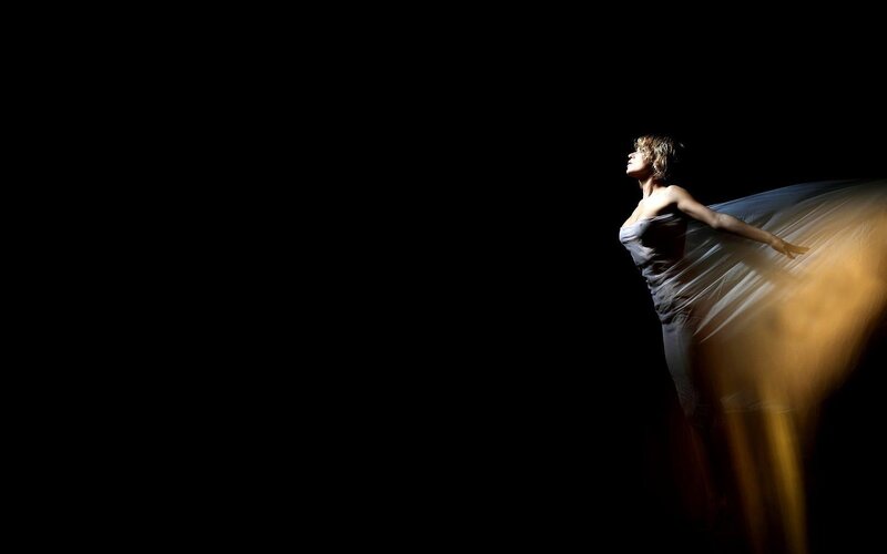 Woman in Flowing Dress — Black, Dramatic, Night, Photograph