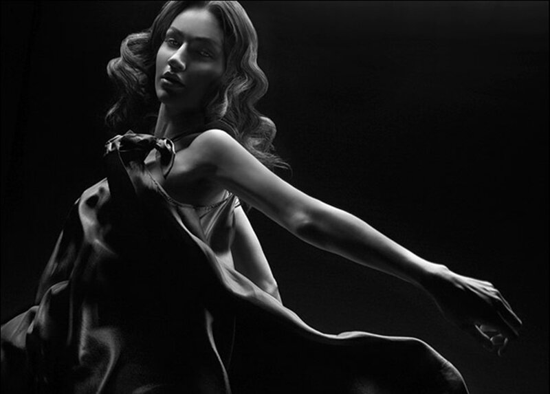 Woman in Flowing Dress — Black, Dramatic, Photograph