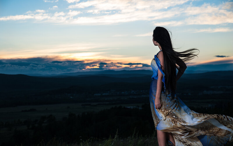 Woman in Flowing Dress — Blue, Serene, Sunset