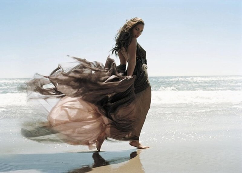 Woman in Flowing Dress — Brown, Serene, Afternoon