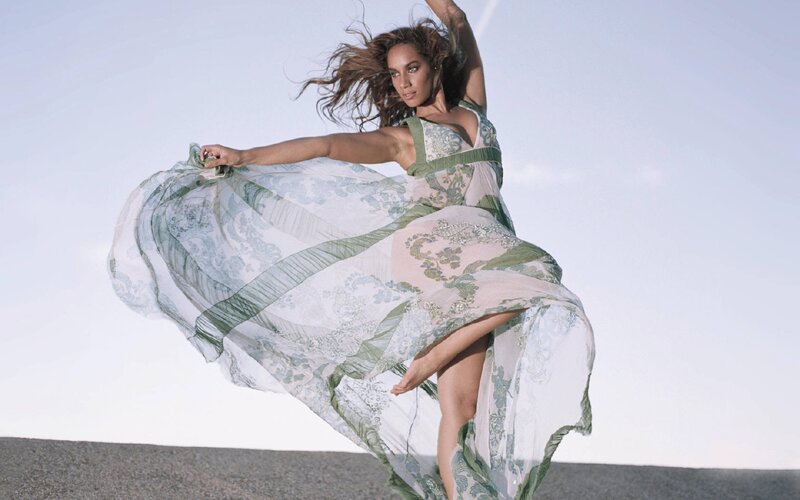 woman in flowing dress dancing