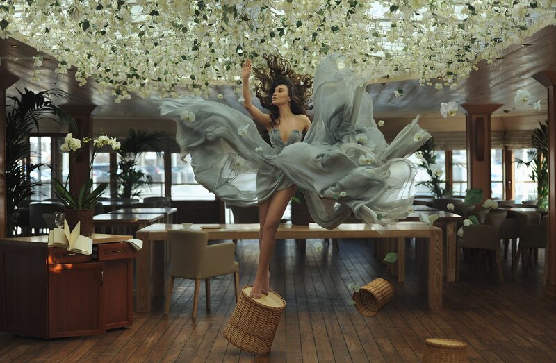 woman in flowing dress dancing