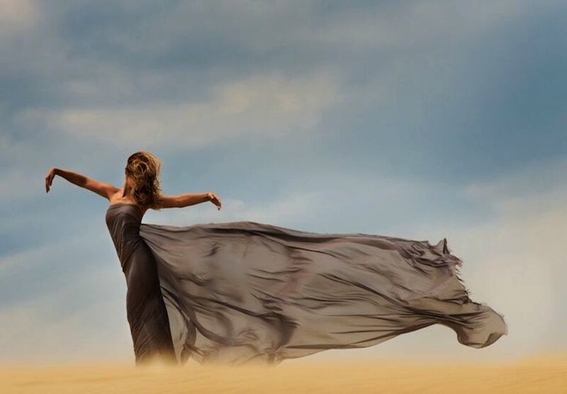 Woman in Flowing Dress — Gray