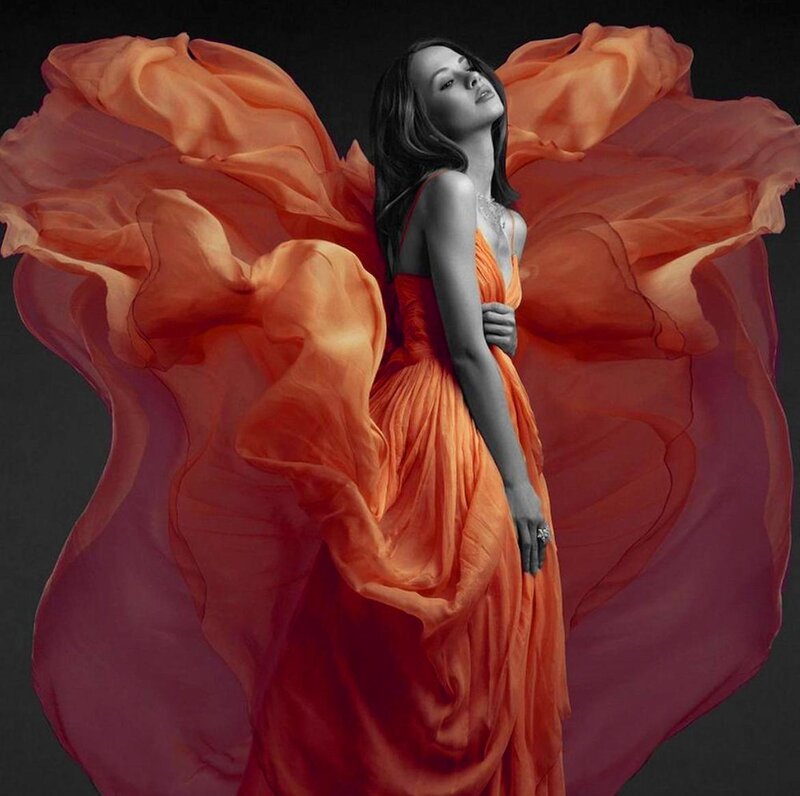Woman in Flowing Dress — Orange, Dramatic, Photograph