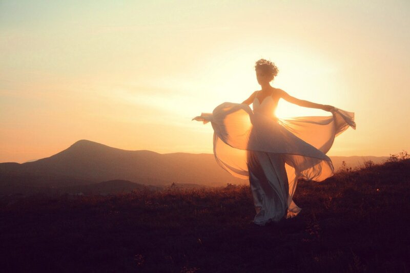 Woman in Flowing Dress — Orange, Serene, Sunset