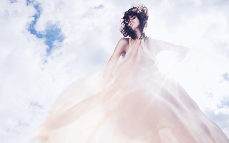 Woman in Flowing Dress — White, Dramatic, Afternoon, Photograph