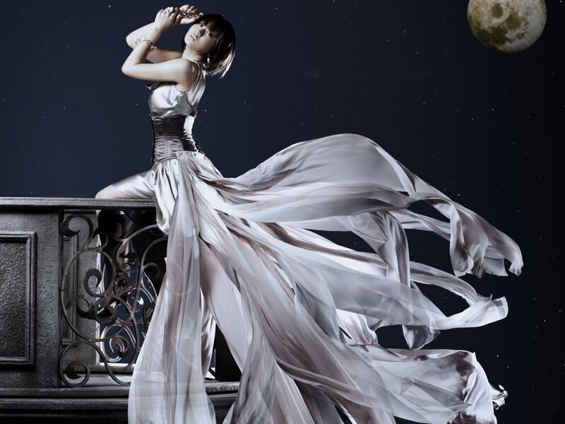 Woman in Flowing Dress — White, Dramatic, Night
